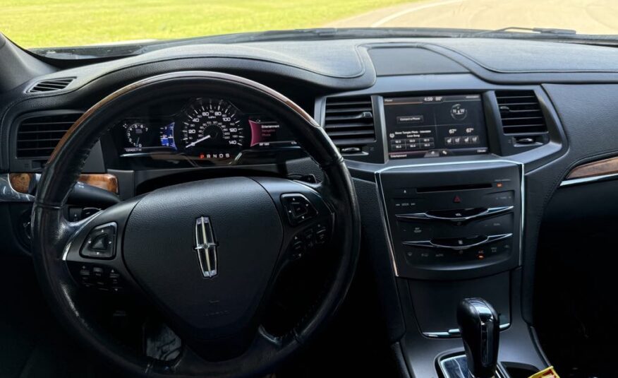 2014 Lincoln MKS          <a href='http://www.carfax.com/VehicleHistory/p/Report.cfx?partner=DVW_1&vin=1LNHL9DK3EG601133'><img src='http://www.carfaxonline.com/assets/subscriber/carfax_free_button.gif' width='120' height='49' border='0'></a>