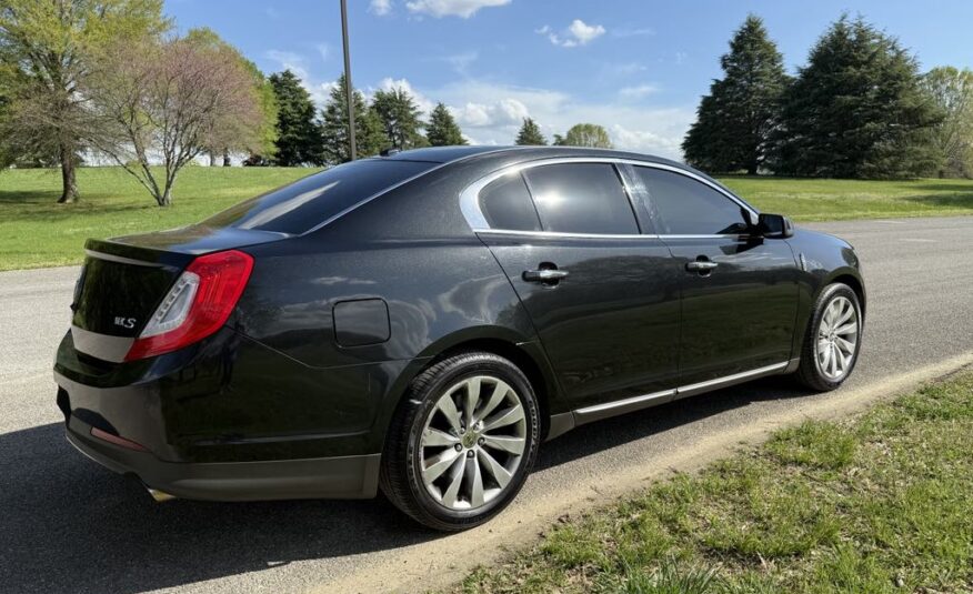 2014 Lincoln MKS          <a href='http://www.carfax.com/VehicleHistory/p/Report.cfx?partner=DVW_1&vin=1LNHL9DK3EG601133'><img src='http://www.carfaxonline.com/assets/subscriber/carfax_free_button.gif' width='120' height='49' border='0'></a>
