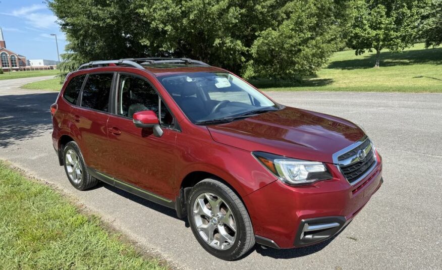 2017 Subaru Forester 2.5i Touring   <a href='http://www.carfax.com/VehicleHistory/p/Report.cfx?partner=DVW_1&vin=JF2SJAWC2HH555902'><img src='http://www.carfaxonline.com/assets/subscriber/carfax_free_button.gif' width='120' height='49' border='0'></a>