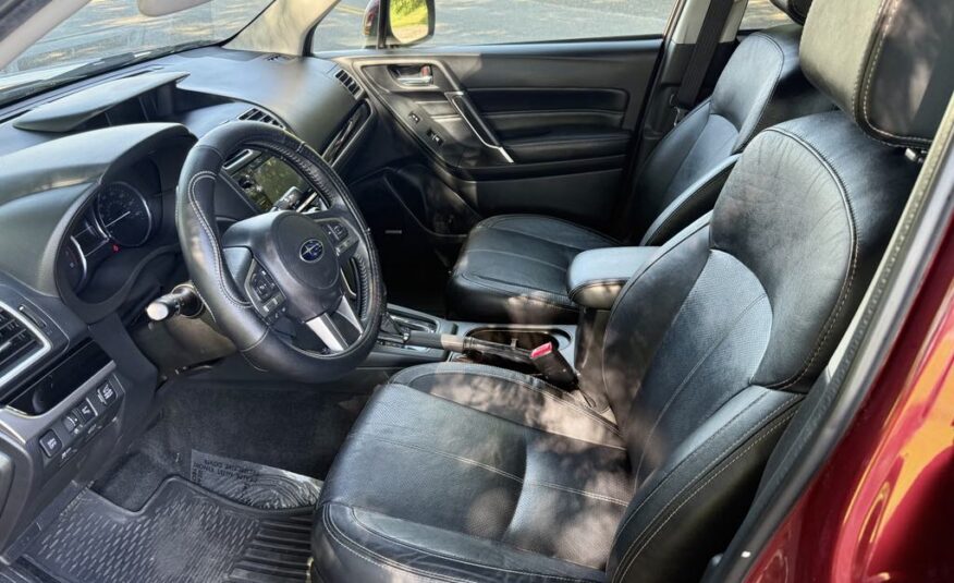 2017 Subaru Forester 2.5i Touring   <a href='http://www.carfax.com/VehicleHistory/p/Report.cfx?partner=DVW_1&vin=JF2SJAWC2HH555902'><img src='http://www.carfaxonline.com/assets/subscriber/carfax_free_button.gif' width='120' height='49' border='0'></a>