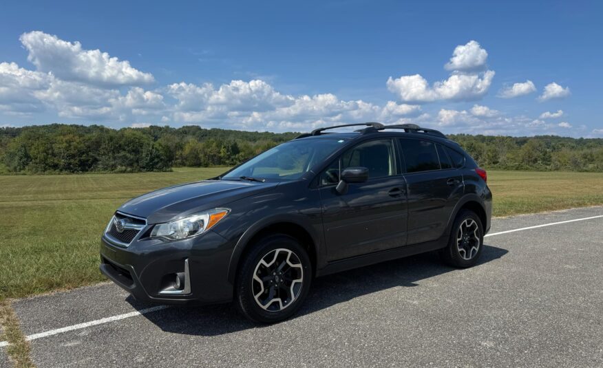 2016 Subaru Crosstrek 2.0i Premium     <a href='http://www.carfax.com/VehicleHistory/p/Report.cfx?partner=DVW_1&vin=JF2GPABC7G8297983'><img src='http://www.carfaxonline.com/assets/subscriber/carfax_free_button.gif' width='120' height='49' border='0'></a>