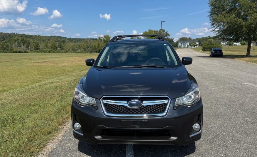 2016 Subaru Crosstrek 2.0i Premium     <a href='http://www.carfax.com/VehicleHistory/p/Report.cfx?partner=DVW_1&vin=JF2GPABC7G8297983'><img src='http://www.carfaxonline.com/assets/subscriber/carfax_free_button.gif' width='120' height='49' border='0'></a>