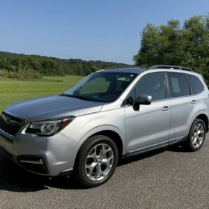 2017 Subaru Forester 2.5i Touring <a href='http://www.carfax.com/VehicleHistory/p/Report.cfx?partner=DVW_1&vin=JF2SJAWC1HH595534'><img src='http://www.carfaxonline.com/assets/subscriber/carfax_free_button.gif' width='120' height='49' border='0'></a>